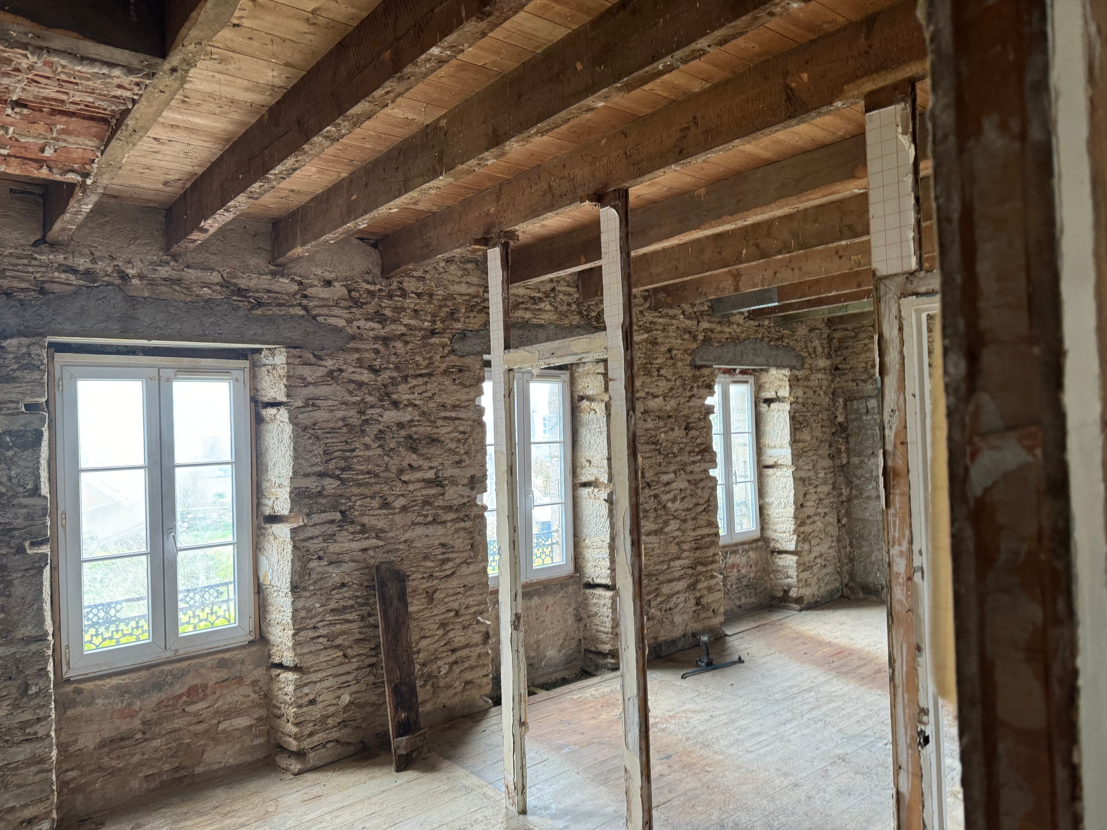 Reprise des sections de bois en charpente